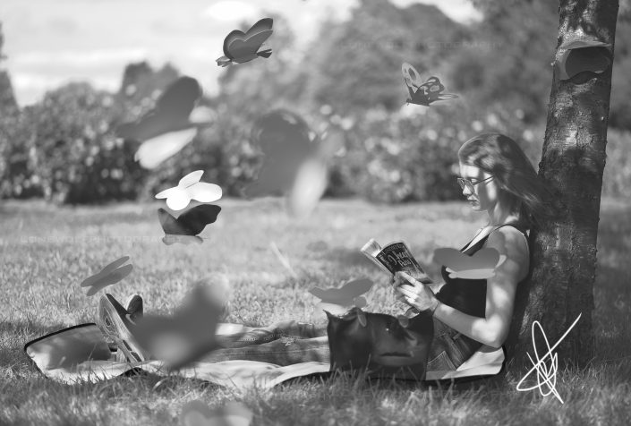 Creative photography of a girl reading a book