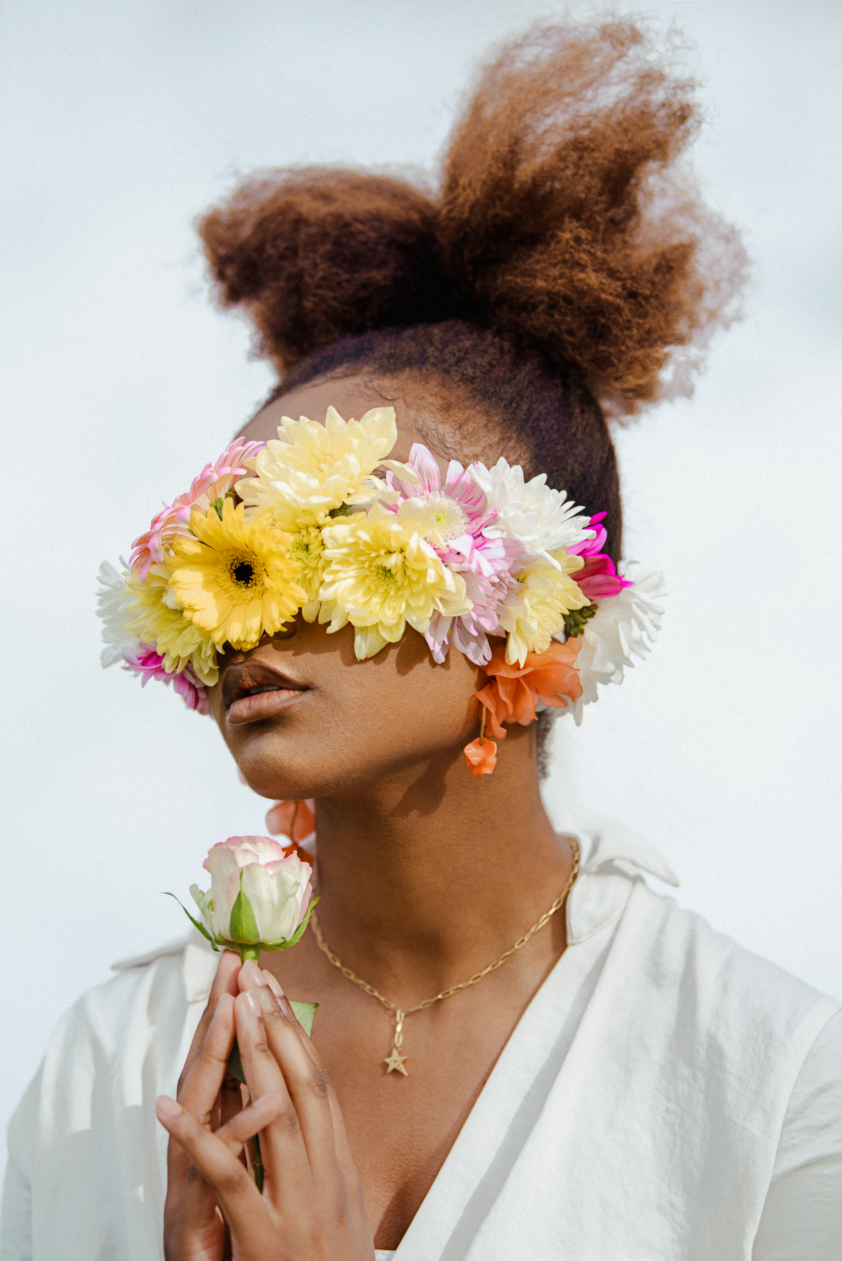 Girl blinded with flowers